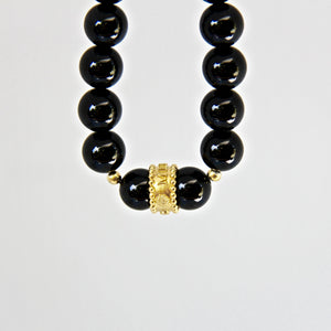 black onyx and gold vermeil necklace with empowering qualities