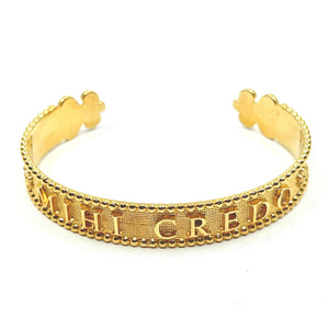 gold vermeil cuff with empowering message in latin